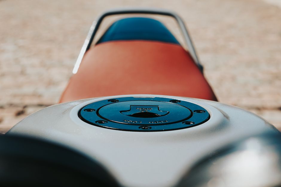 Detailed close-up of a motorcycle fuel cap with focus on design and style.