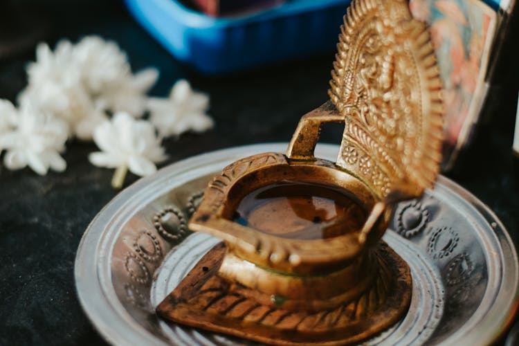 Close-Up Shot Of Brass Oil Lamp