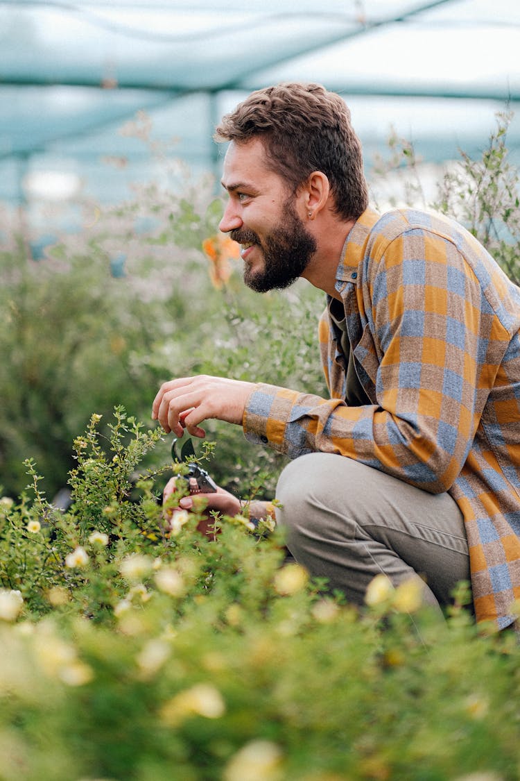 Side View Of A Man Gardening