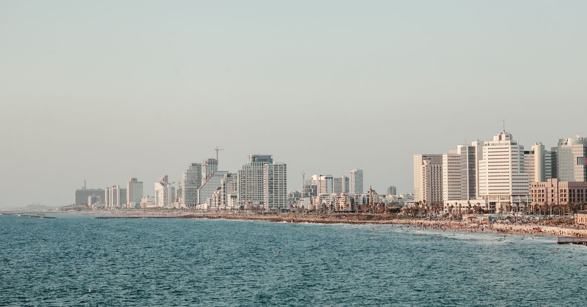 Tel Aviv beach promenade with Mediterranean Sea at sunset