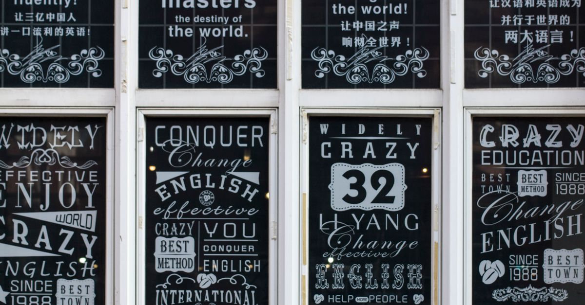 Window Wit Text Sample Close-Up Shot of Windows with Text Design · Free Stock Photo