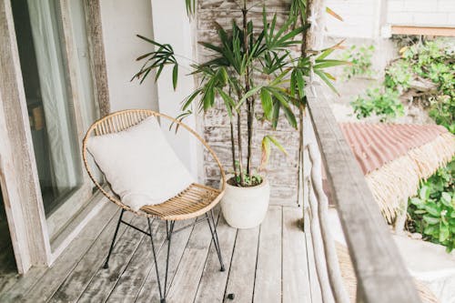 Free Potted plant and chair on balcony Stock Photo