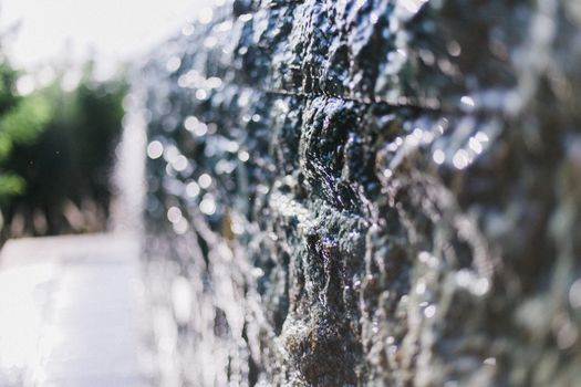 Wet old stone in sunlight