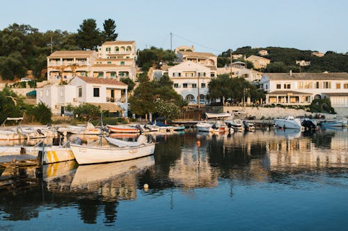 Small coastal town with boats in dusk