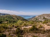 Breathtaking landscape of hills and lake in Moustiers-Sainte-Marie, Provence.