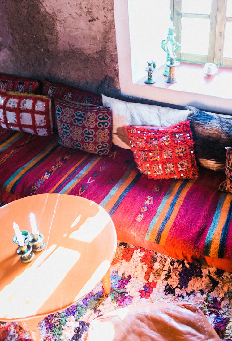 Oriental Interior Of Room With Sofa On Floor