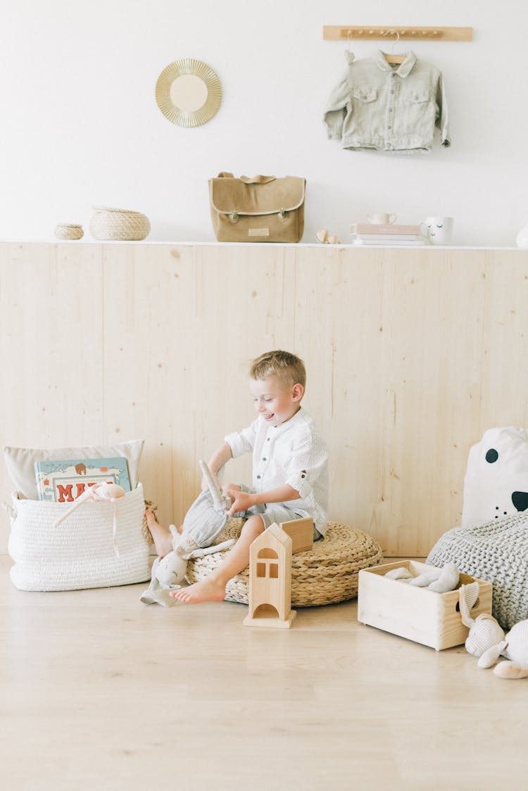 Cute Boy Playing With His Toy