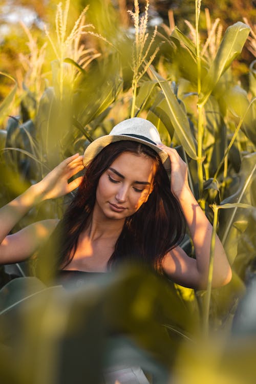 Woman Posing with Hands on Head