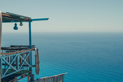 Balcony of lifeguard tower in front of blue ocean