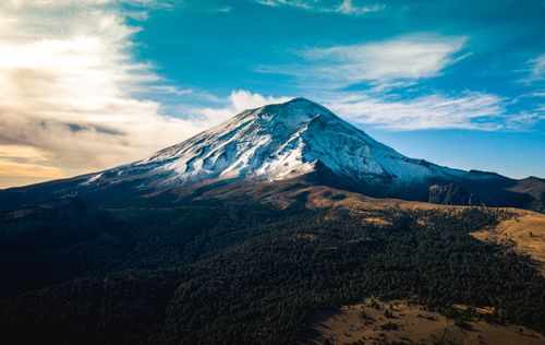 Free Breathtaking view of a snowcapped mountain against a clear sky, ideal for nature and travel themes. Stock Photo