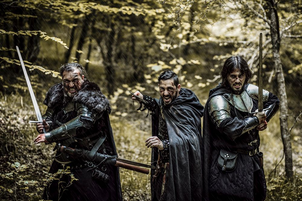 Armored warriors ready for battle in a dark forest