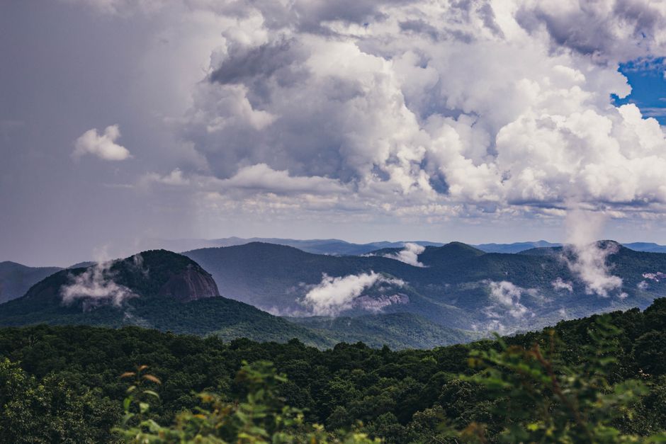 A breathtaking view of the Blue Ridge Mountains in Asheville, NC with dramatic cloud formations.
