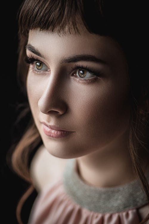 Free Sensual woman with light makeup in studio Stock Photo