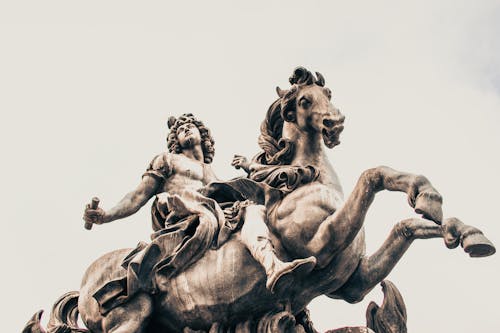 Free A Statue of a Woman Riding a Horse Stock Photo