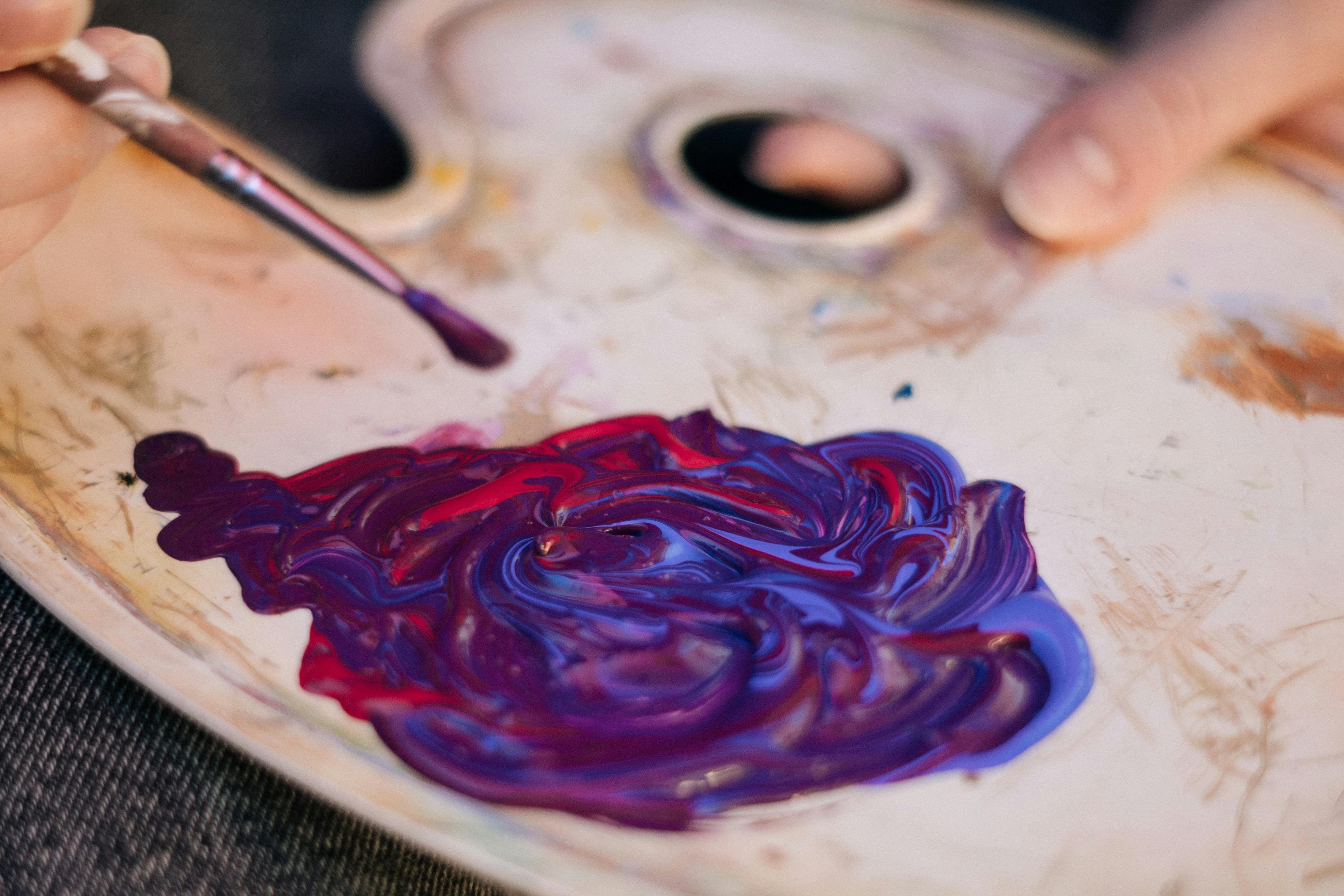 Close-Up Shot of a Painter Putting Acrylic Paint on a Palette