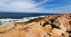 Rocky Coast near Blue Ocean Water