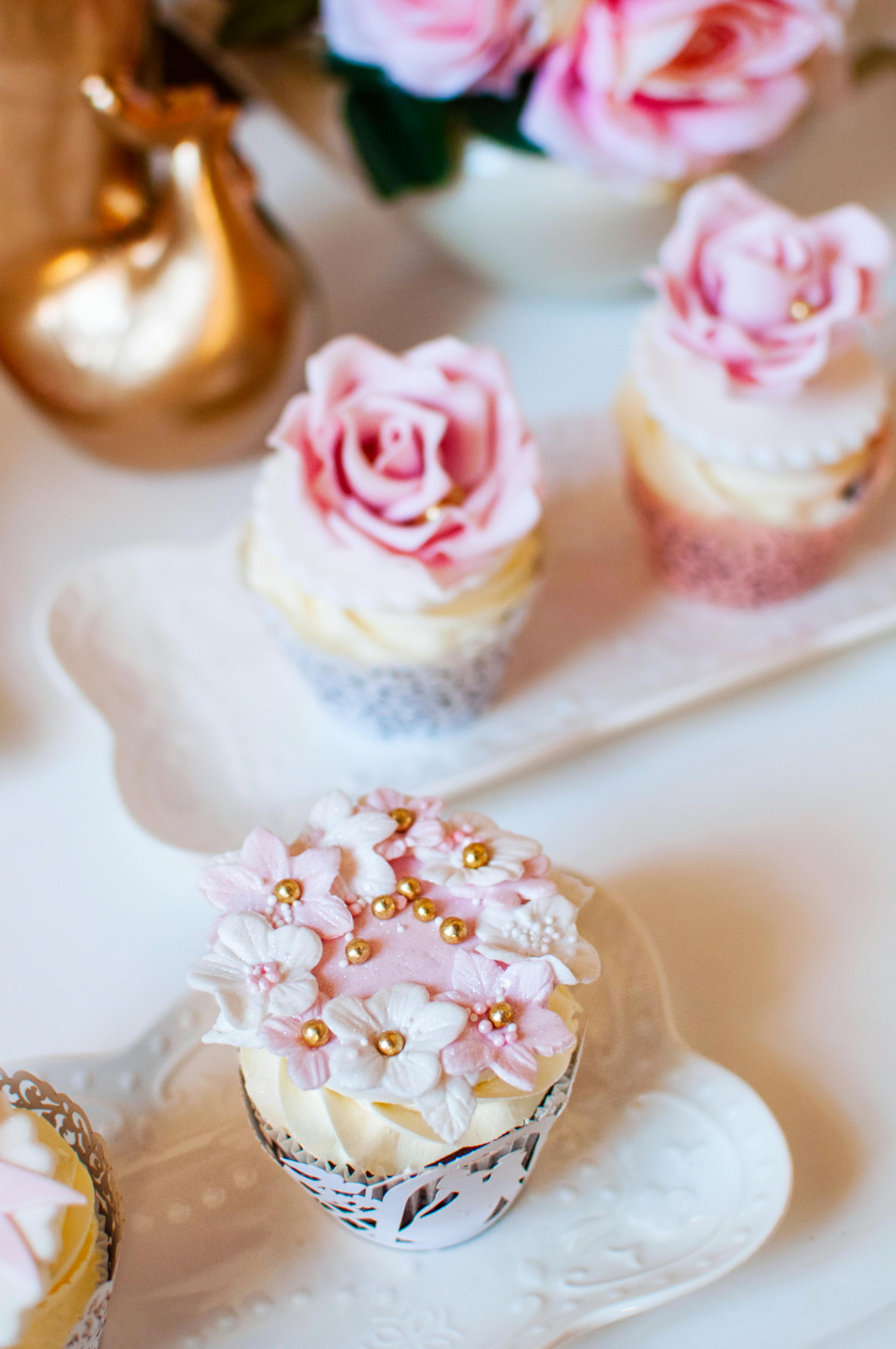 Beautifully decorated floral cupcakes perfect for weddings or special events.