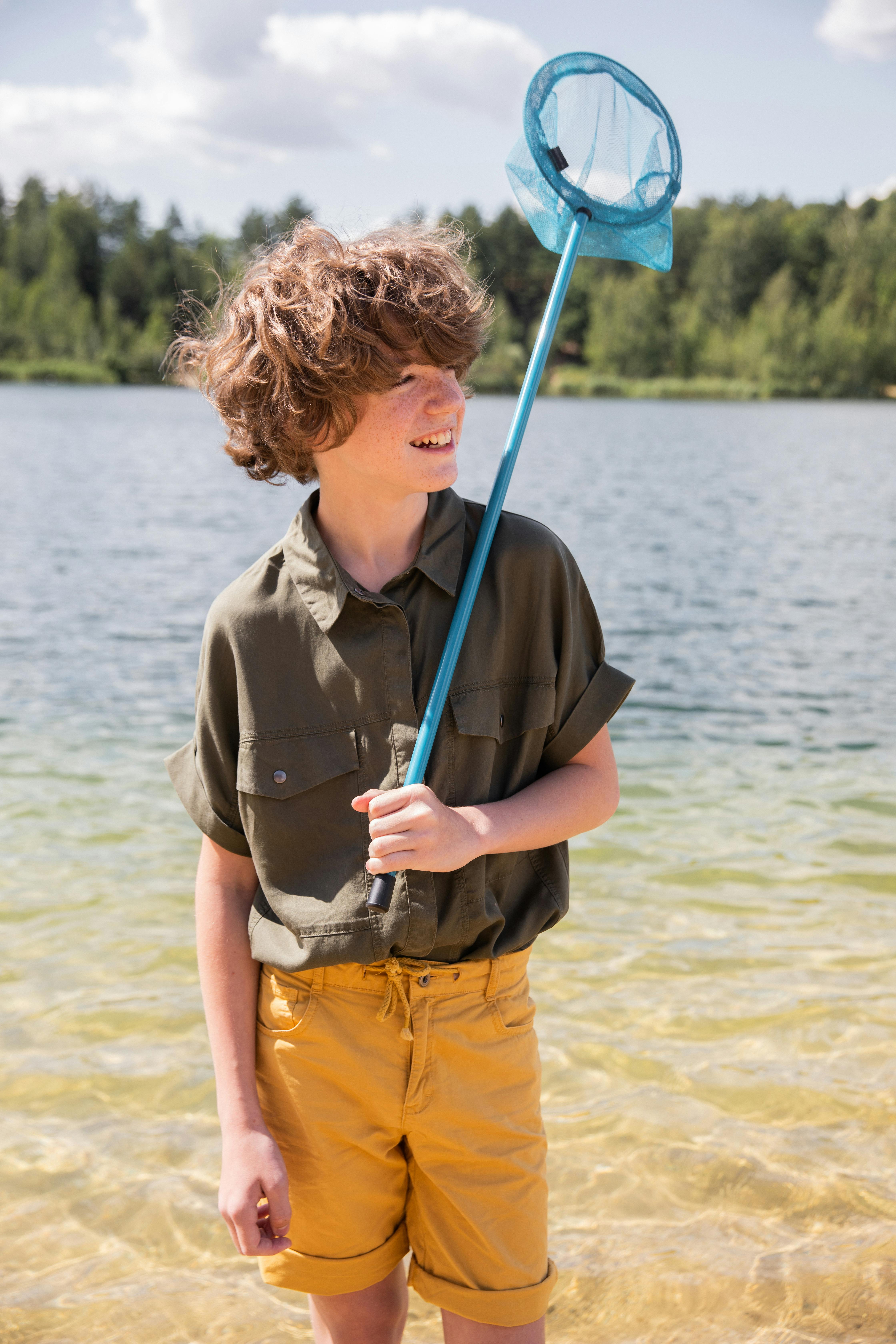 3,300+ Kid Fishing Net Stock Photos, Pictures & Royalty-Free
