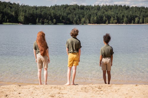 Free Children Standing Near Beach Stock Photo