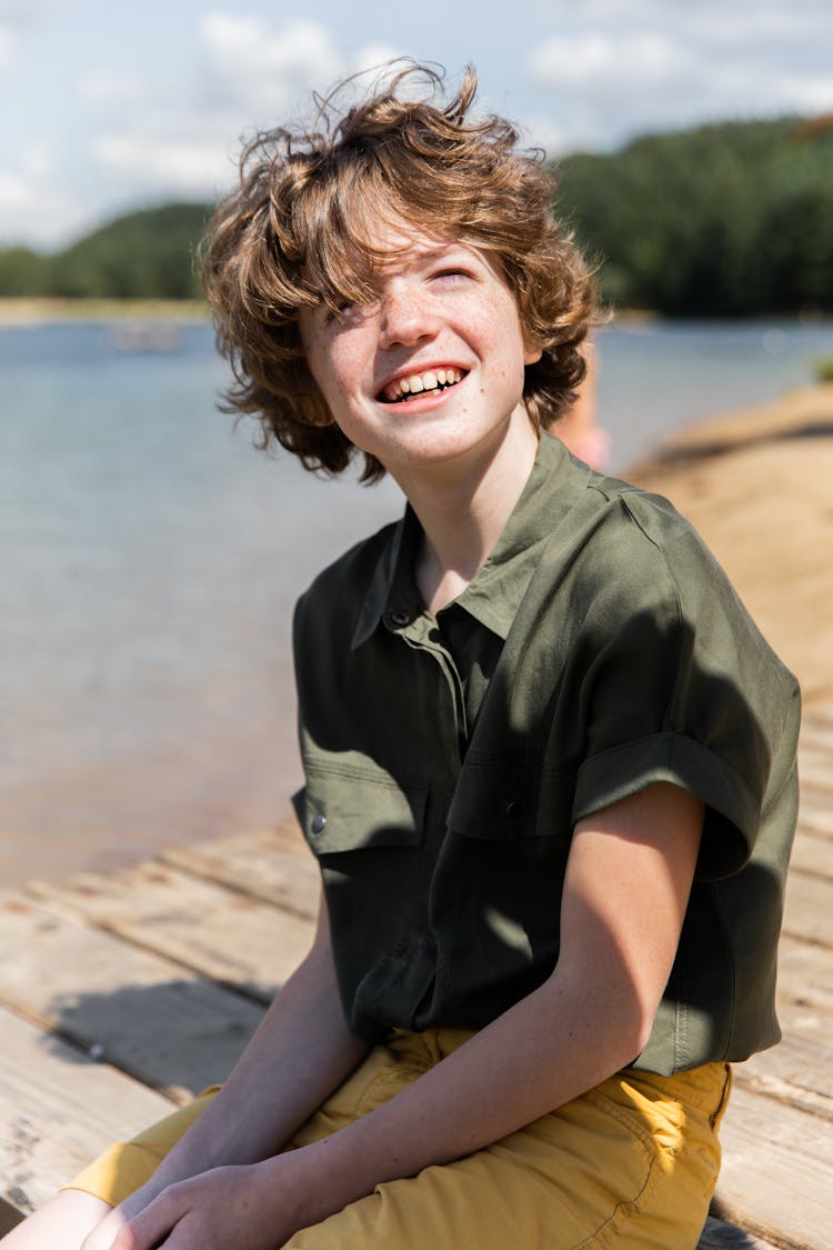 Boy In Polo Smiling 