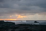 Ocean Waves Crashing on Rocks during Sunset