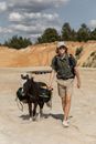 Boy Walking Donkey on Beach