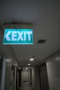 Green and White Exit Sign