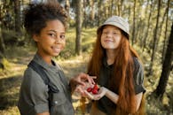 Scout Girls with Strawberries in Forest
