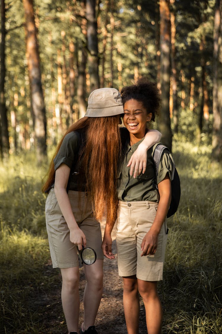 Scout Girls Chatting And Laughing At Forest