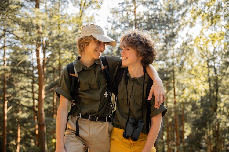 Boy And Girl In Forest Together