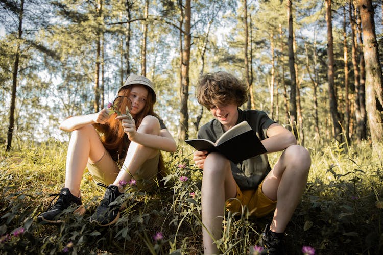 Boy And Girl In Forest Together