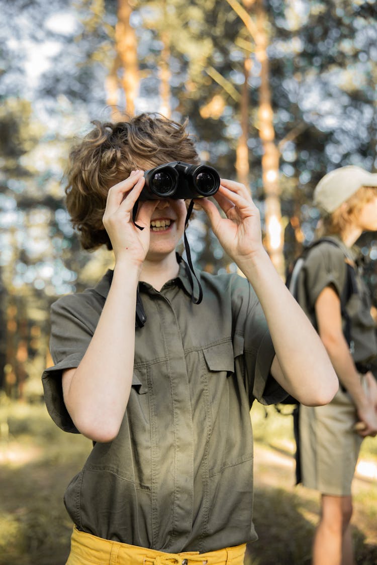 Boy With Binoculars On Vacation