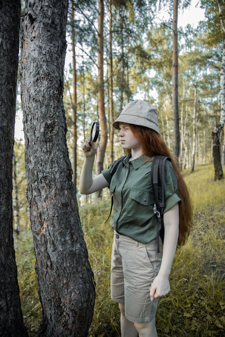 Girl Scout With Magnifying Glass Observe Tree