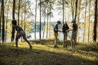 People Standing on Green Grass Field