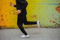 Man in Black Suit Jacket and Pants Wearing White Nike Sneakers