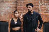 Woman in Black Spaghetti Strap Top Beside Woman in Black Crop Top