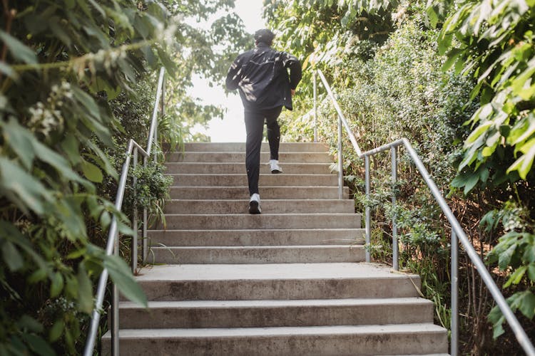 Man Running Up The Steps