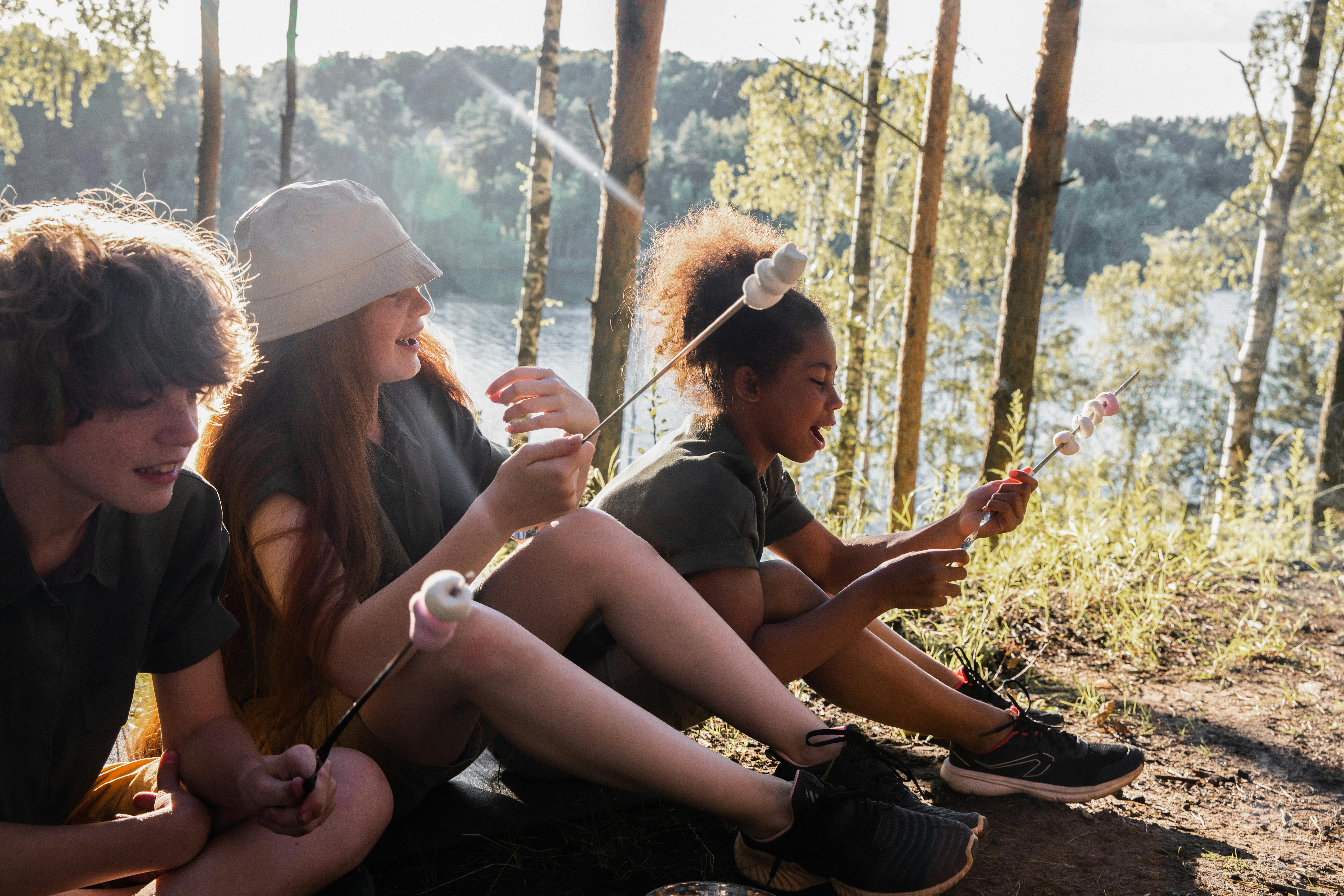 kids with marshmallows in forest