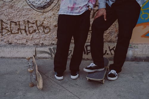 People Standing Near Skateboard