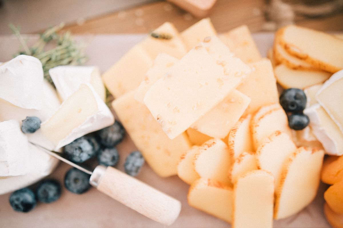 Close-up of sliced artisan cheese to buy online in the UK