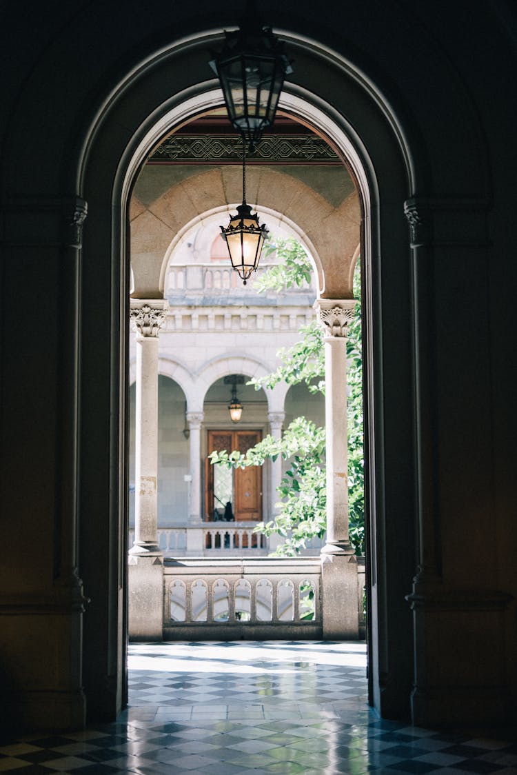 Pendant Lights In Front Of An Arched Doorway