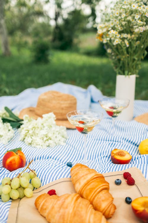 Food and Drinks on Picnic Blanket