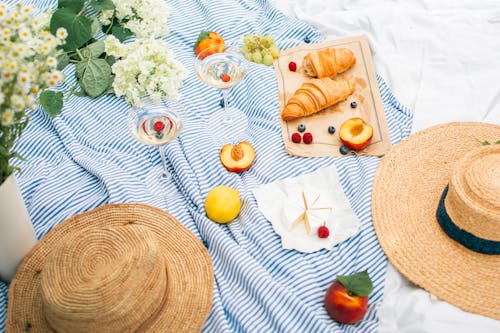 Sliced Bread on White Ceramic Plate Beside Clear Drinking Glass