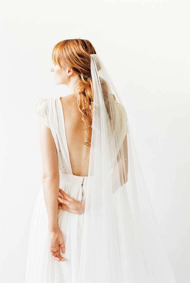 Tender Bride In Veil And Backless Dress