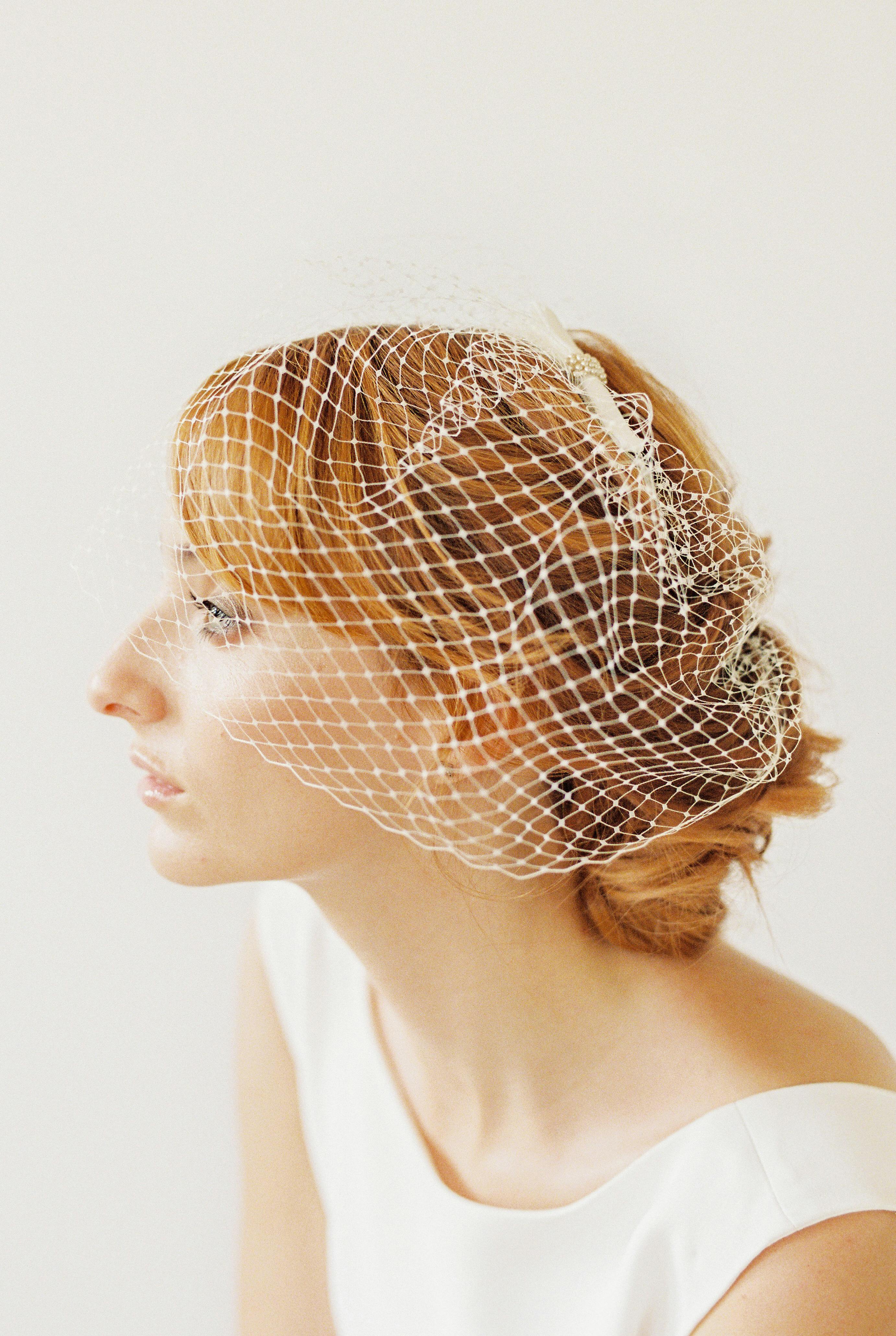 Bride and Groom Kissing under White Wedding Veil · Free Stock Photo