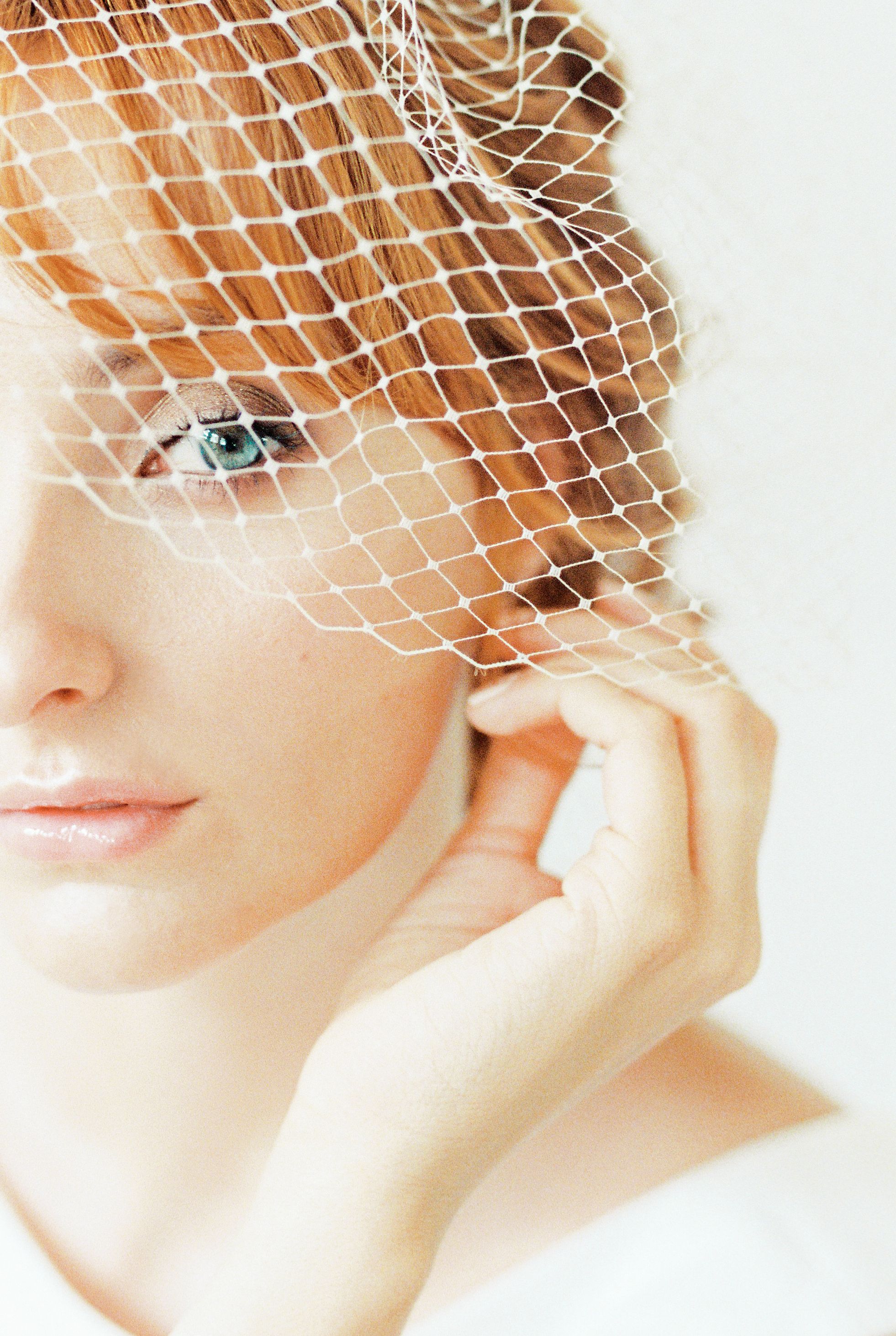 Woman in a Hat and Veil over her Face · Free Stock Photo