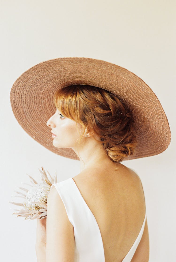 A Woman Wearing Sun Hat