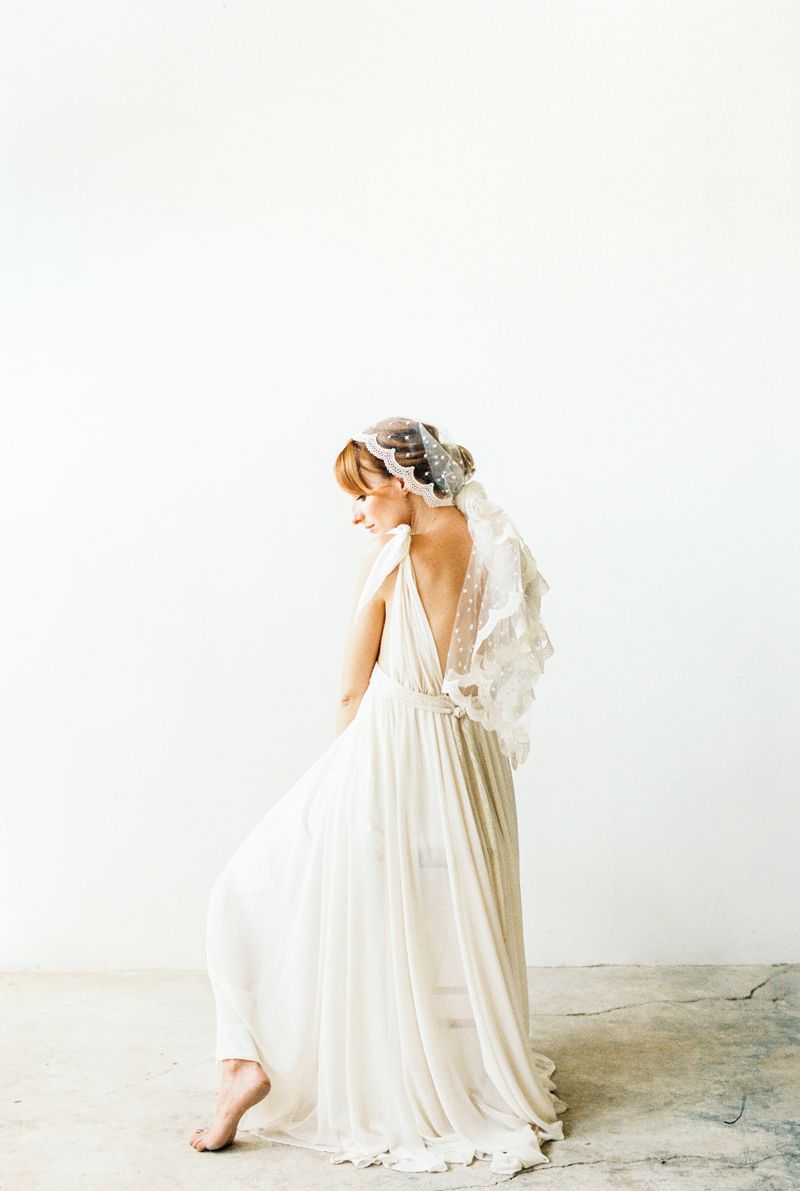 Bride in an elegant gown captured in soft light