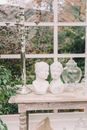 White Ceramic Figurines on Window