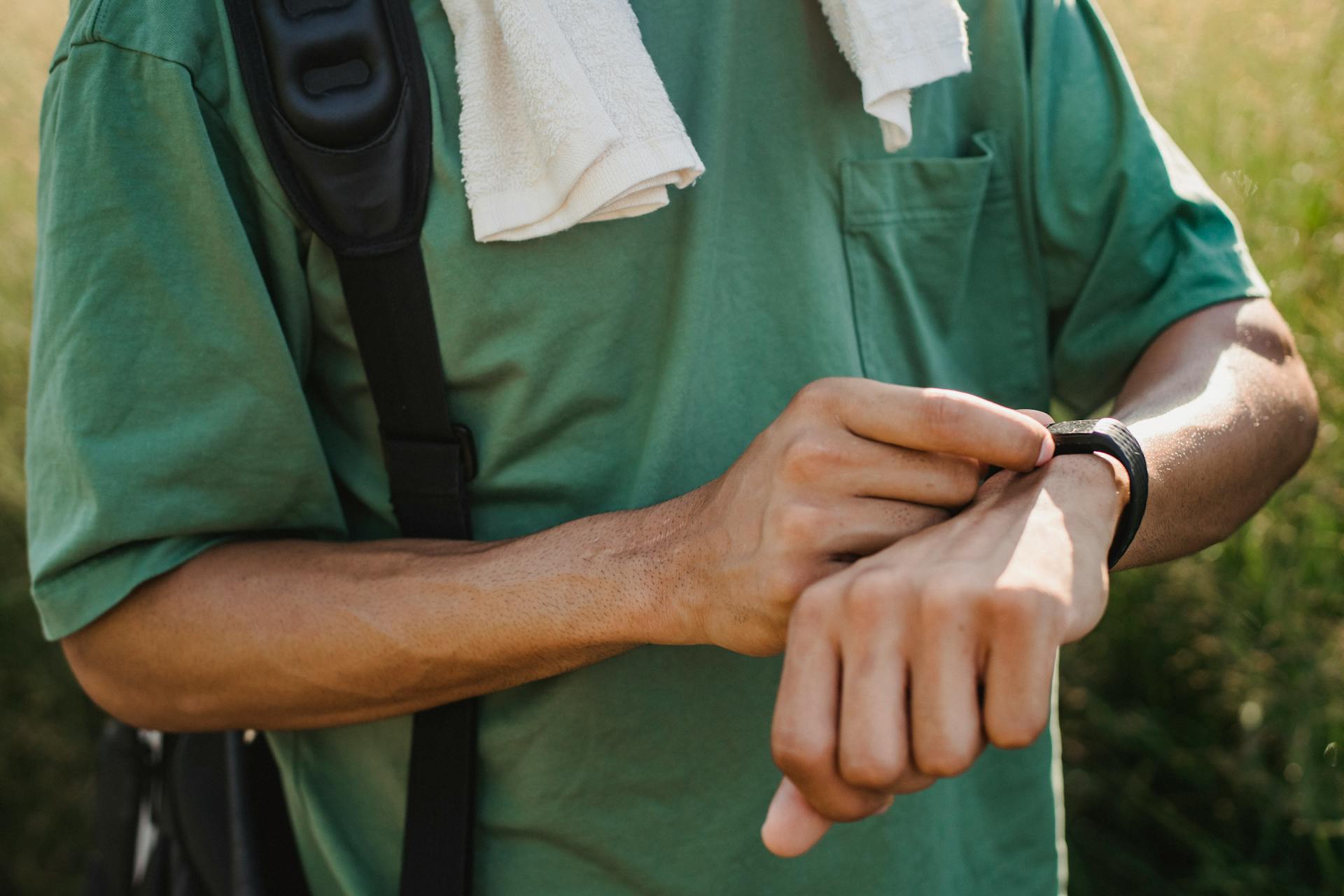 Man Checking his Smart Watch